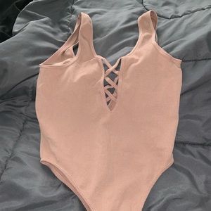 Pink bodysuit